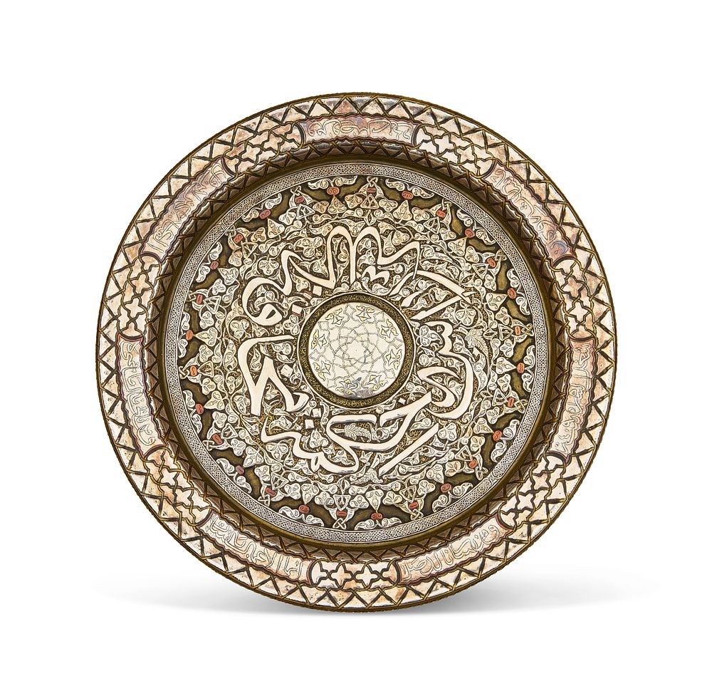 Lot 173: A MAMLUK REVIVAL DISH INLAID WITH GOLD, SILVER, COPPER AND BRASS, SYRIA, CIRCA 1900