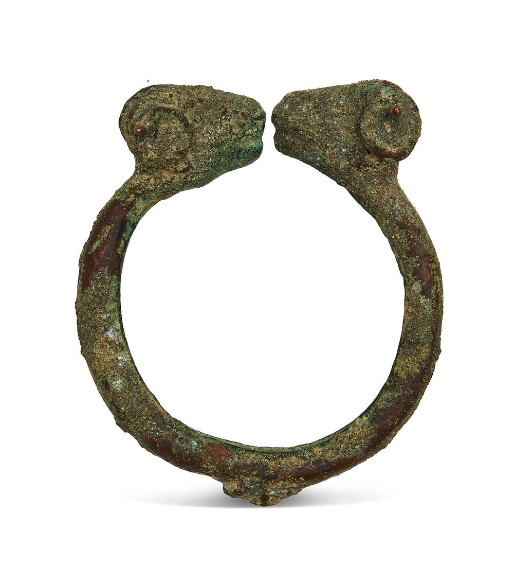 Lot 103: AN ANCIENT GREEK BRONZE BANGLE WITH RAMS HEAD