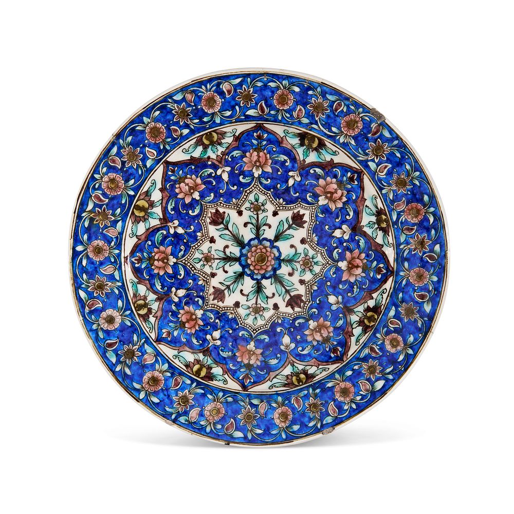 Lot 315: A QAJAR POTTERY DISH, PERSIA, 19TH CENTURY