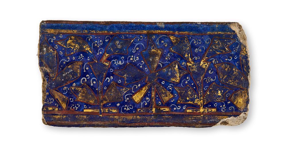 Lot 328: A BLUE LAJVARDINA MOULDED POTTERY TILE, PERSIA, 12TH - 13TH CENTURY