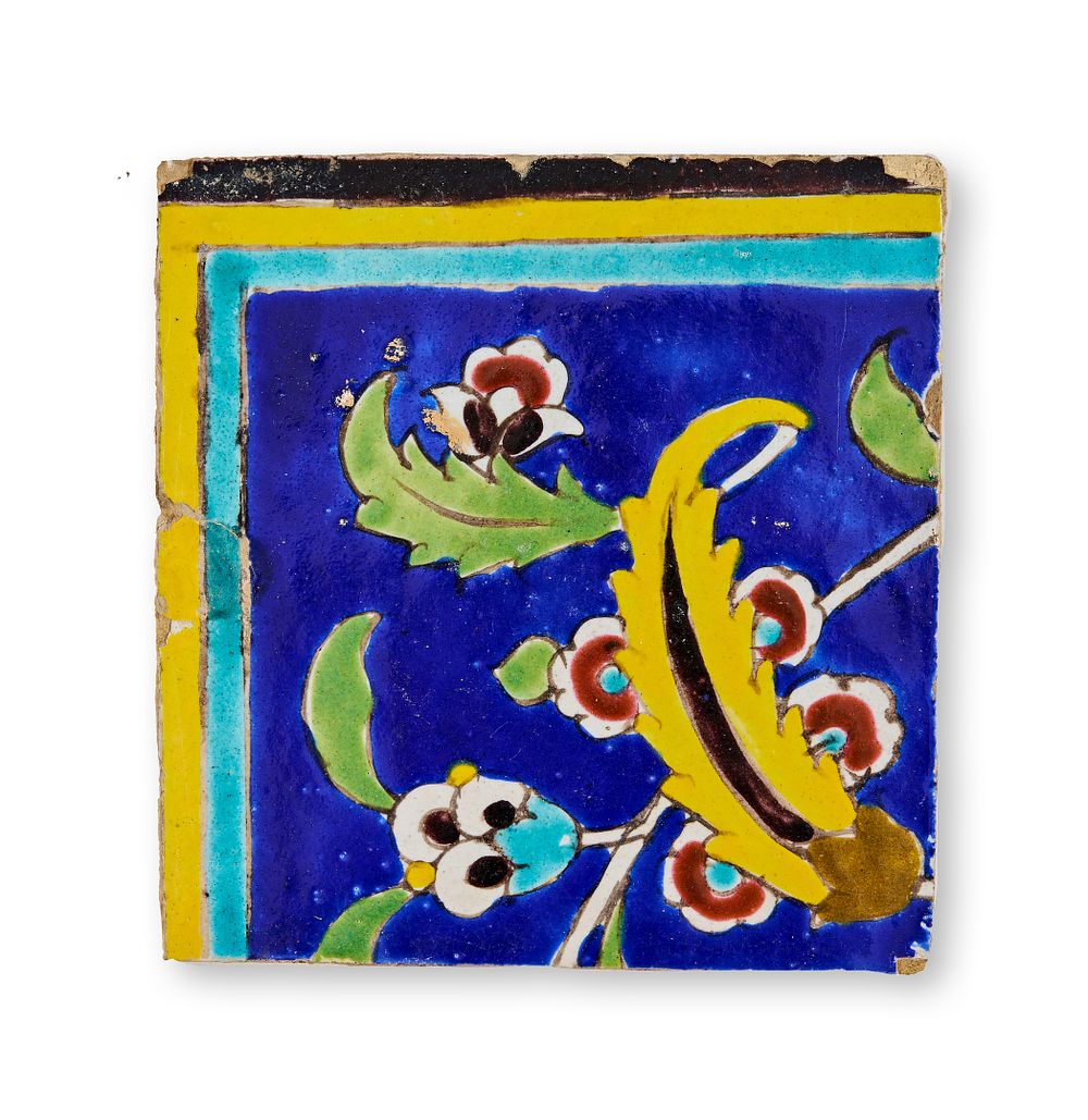 Lot 335: A SAFAVID CUERDA SECA POTTERY TILE, IRAN, 17TH CENTURY