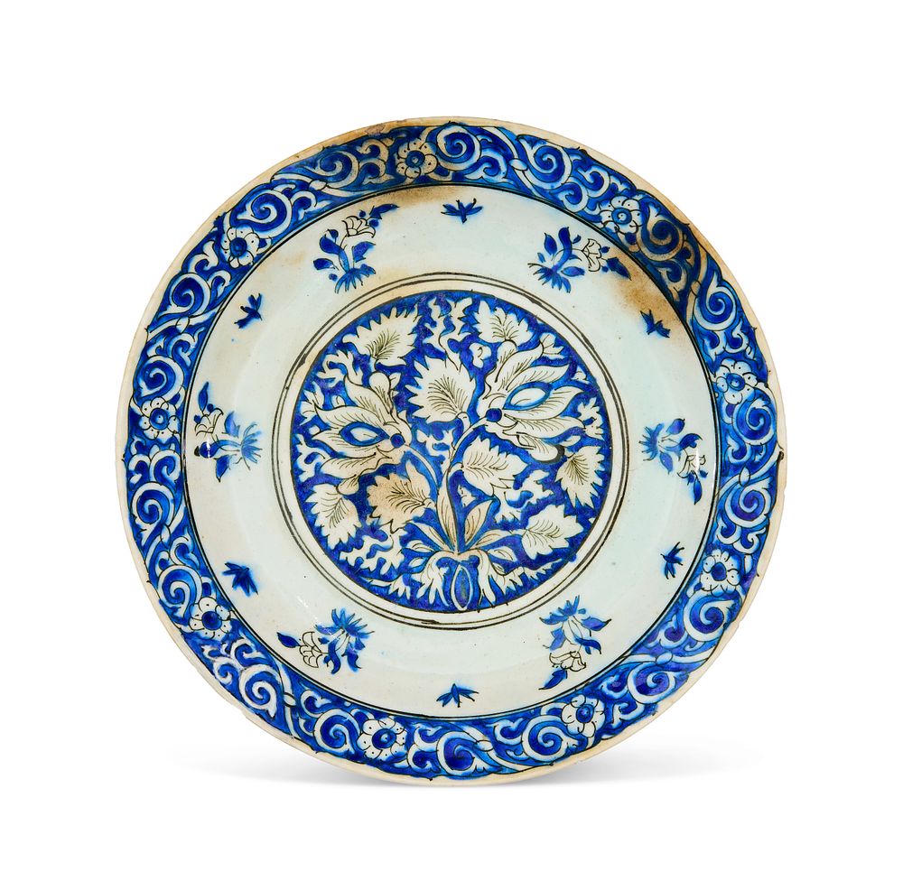 Lot 312: A SAFAVID BLUE AND WHITE "KUBACHI" POTTERY DISH, IRAN TABRIZ, 17TH CENTURY