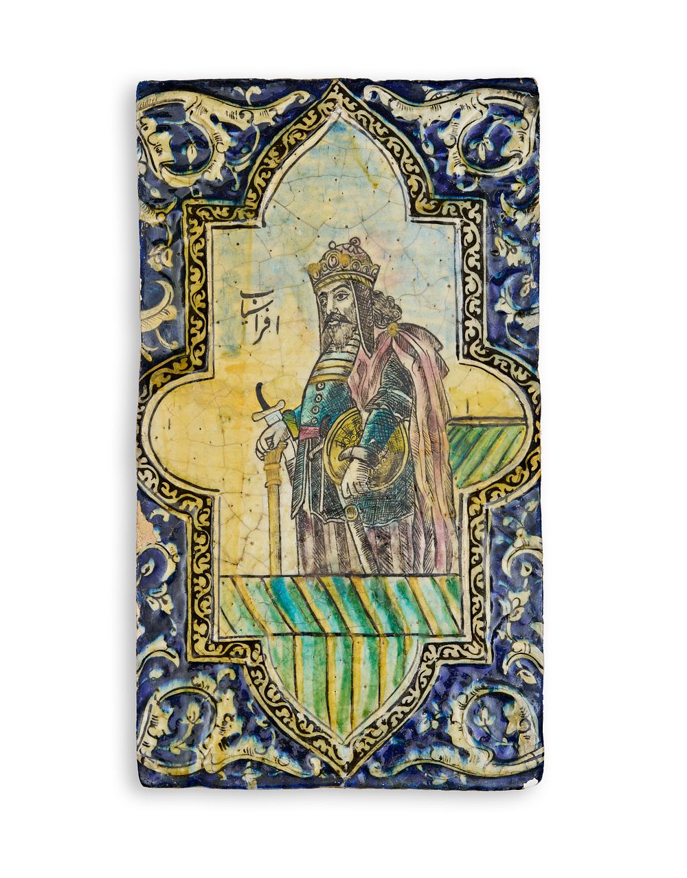Lot 338: A LARGE UNDERGLAZE PAINTED MOULDED POTTERY TILE DEPICTING SASANIAN KING, PERSIA, 19TH CENTURY