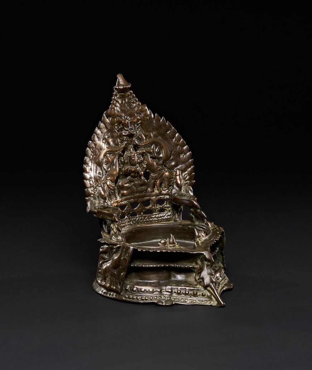 Lot 208: A SOUTH INDIAN BRONZE GAJA LAKSHMI OIL LAMP, KERALA, 17TH CENTURY OR EARLIER