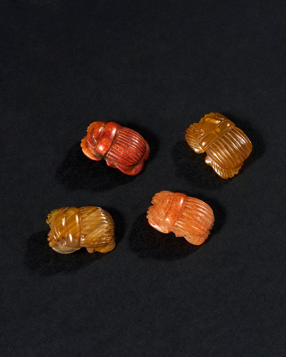 Lot 96: A COLLECTION OF EGYPTIAN AGATE SCARAB, LATE PERIOD, 664 - 323 B.C.