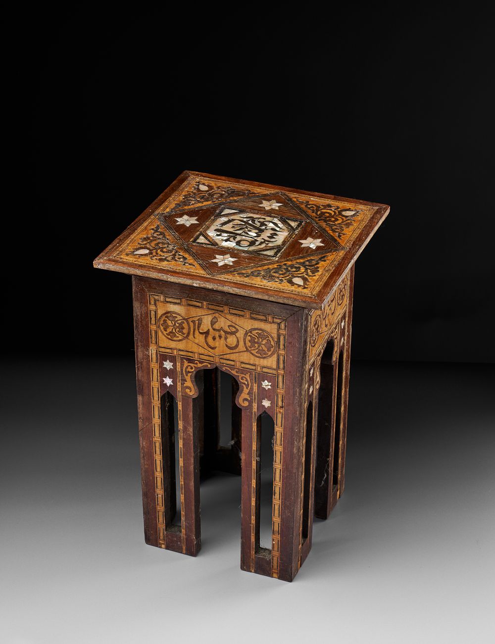 Lot 166: AN ISLAMIC MOTHER OF PEARL AND MARQUETRY INLAID TABLE, DAMASCUS, CIRCA 1900