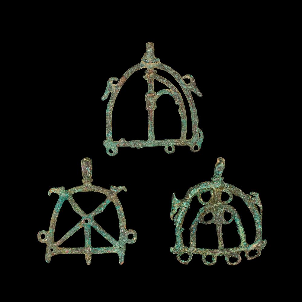 Lot 224: A THREE BRONZE HORSE ATTACHMENTS, AMLASH PERIOD, 1ST MILLENNIUM B.C.