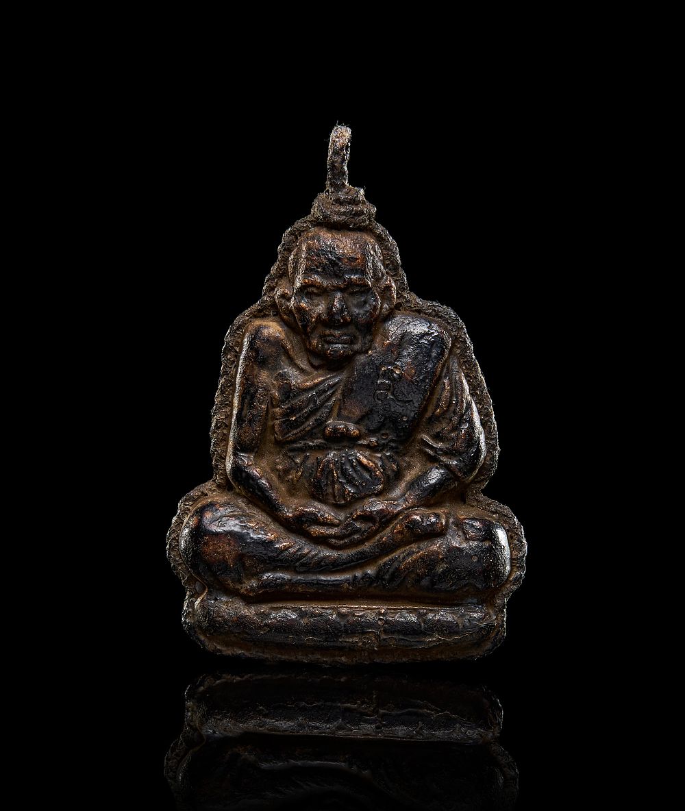 Lot 209: A LEATHER BUDDHIST DEITY OR MONK, POSSIBLY EASTERN TIBET, 19TH CENTURY OR EARLIER