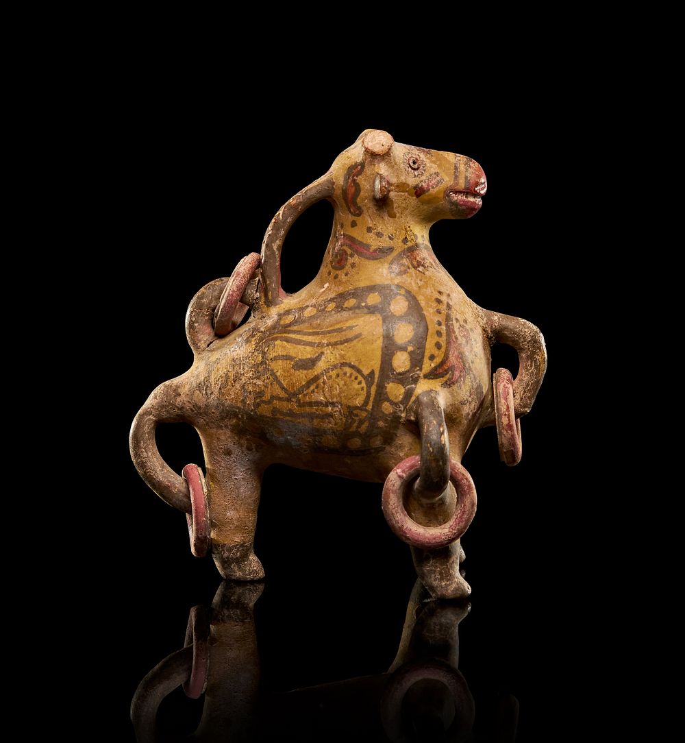 Lot 234: A POLYCHROME POTTERY FIGURE OF A COW, CENTRAL ASIA, 8TH-10TH CENTURY A.D.