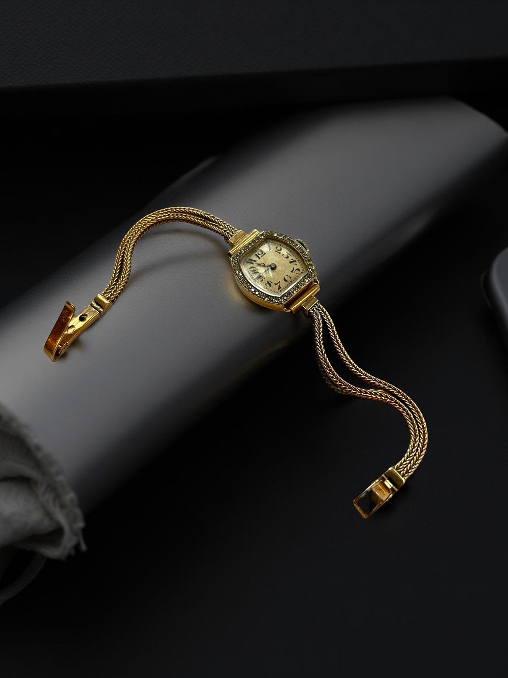 Lot 325: Art Deco era 9ct gold and diamond ladies cocktail watch.