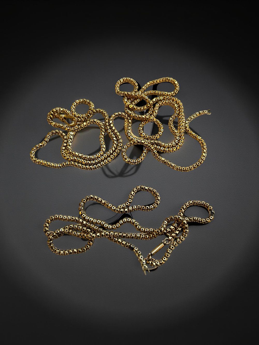 Lot 328: 9ct gold Victorian guard chain.