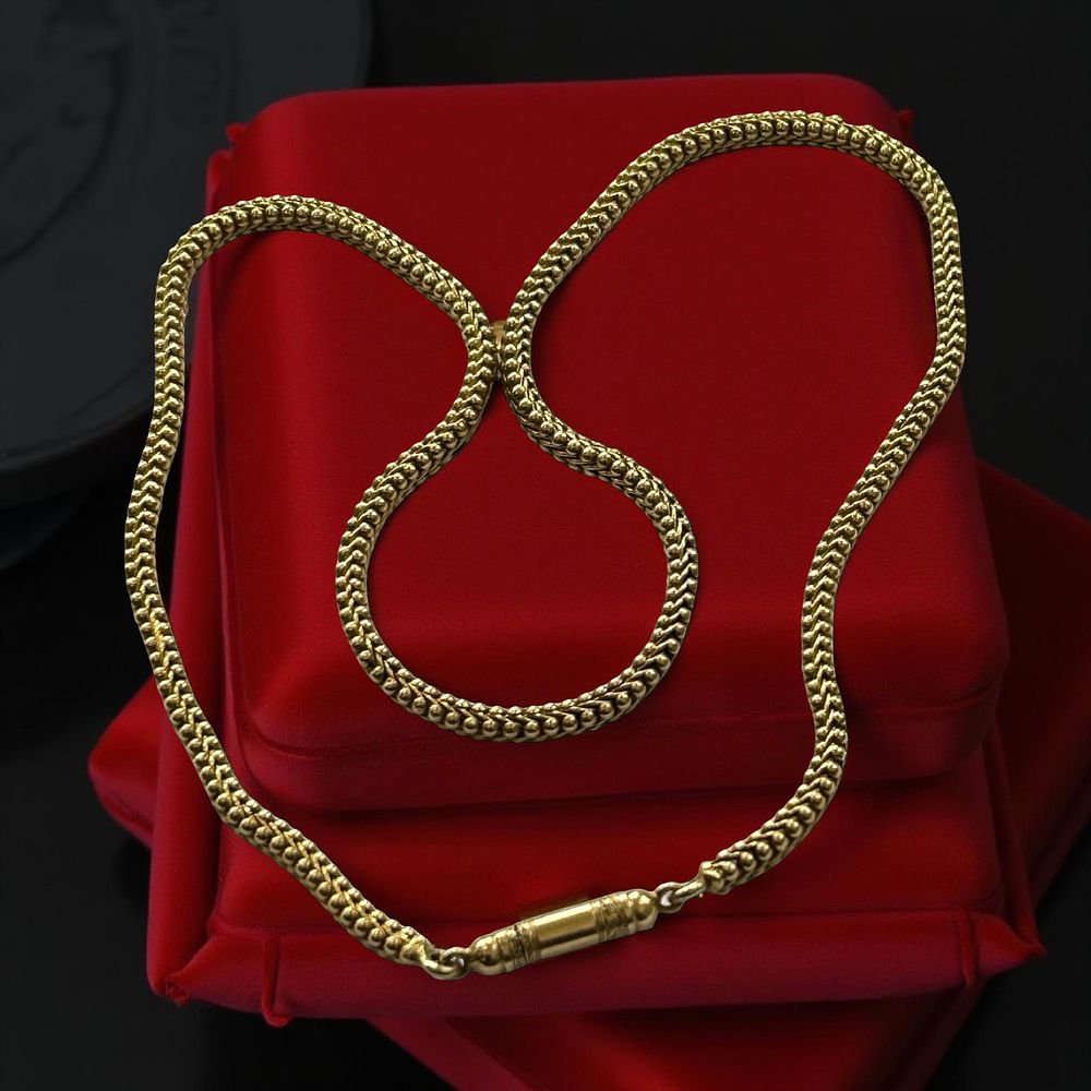 Lot 348: Yellow metal (testing as 18ct Gold) fancy link chain.