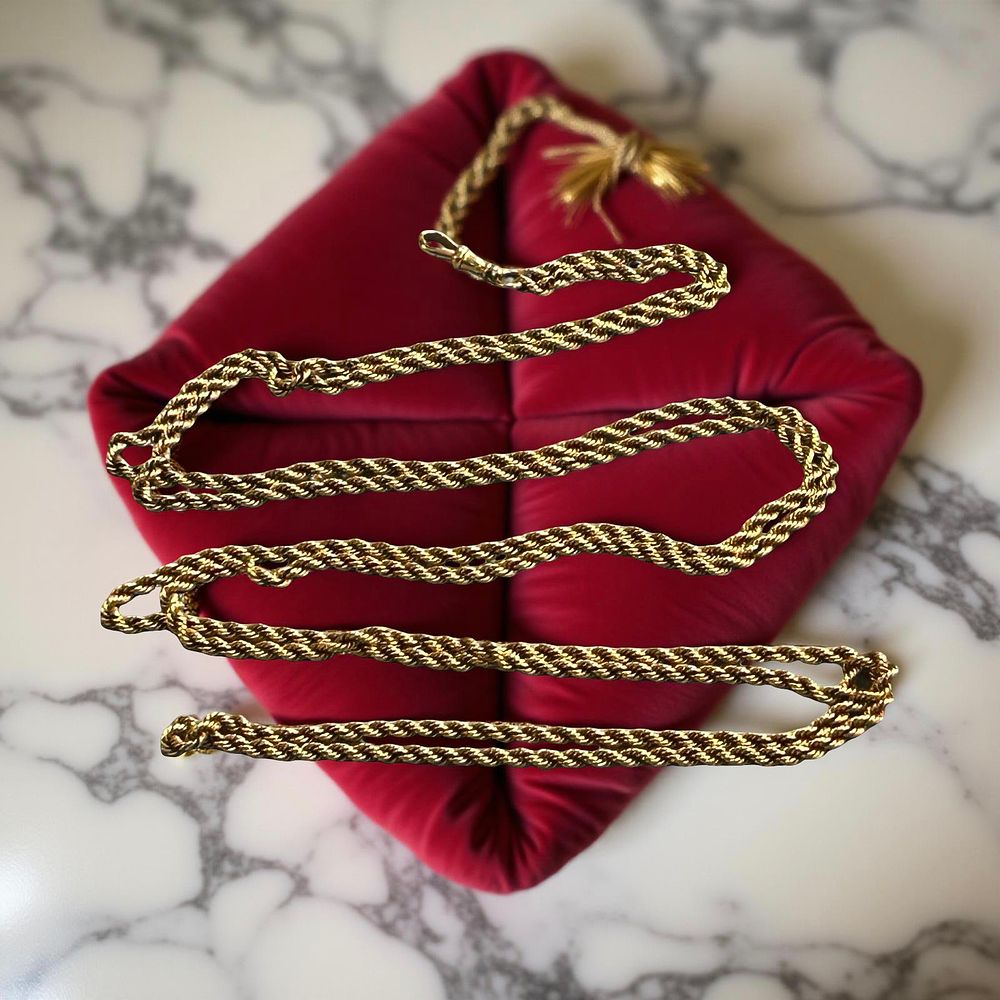 Lot 349: 18ct Gold rope guard chain.