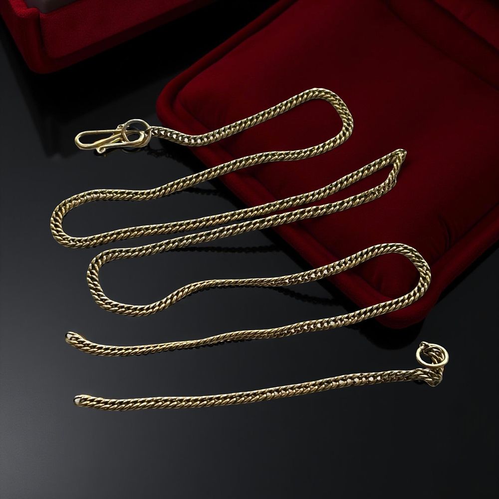 Lot 350: Yellow metal (testing as 9ct gold), broken curb chain.