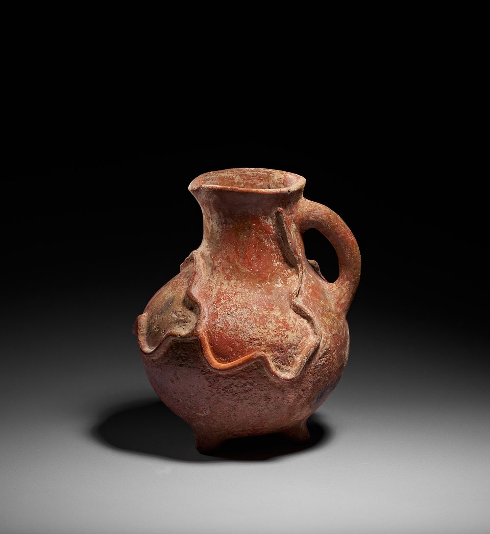 Lot 158: A CYPRIOT MOULDED POTTERY JUG, MIDDLE BRONZE AGE, 1850 - 1650 B.C.