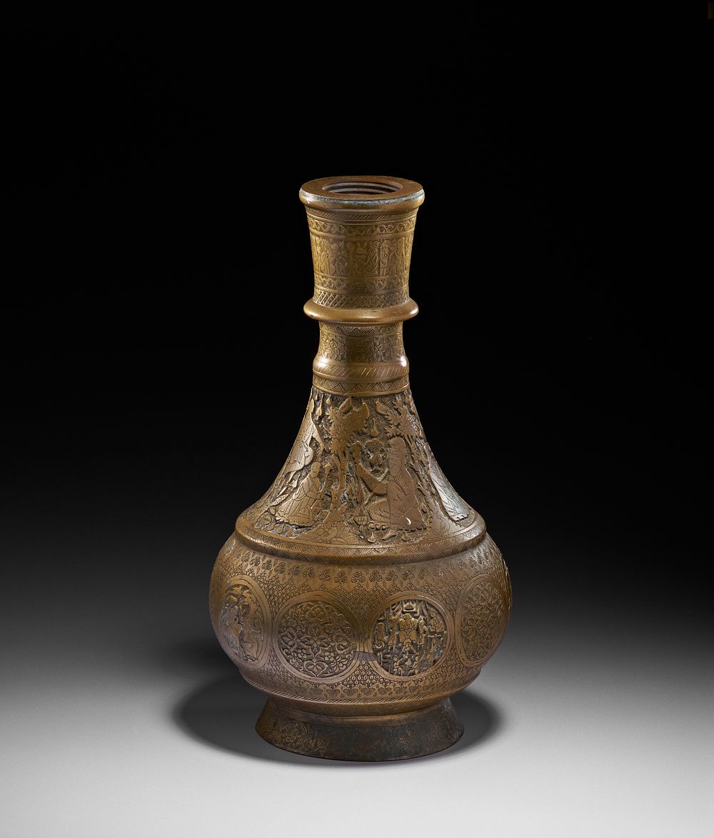 Lot 167: A HEAVILY ENGRAVED BRASS PERSIAN HOOKAH BASE/VASE, QAJAR, 19TH CENTURY