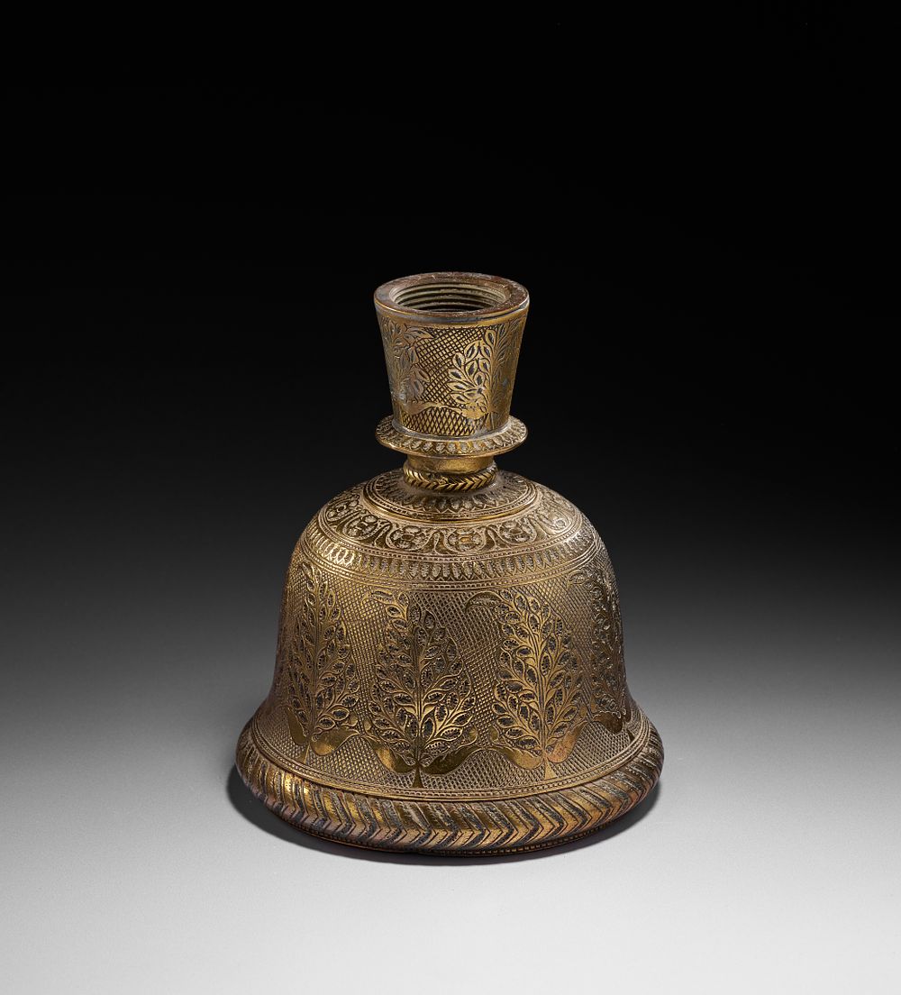 Lot 168: A BRASS BELL SHAPED INDIAN HOOKAH BASE, MUGHAL, 18TH CENTURY
