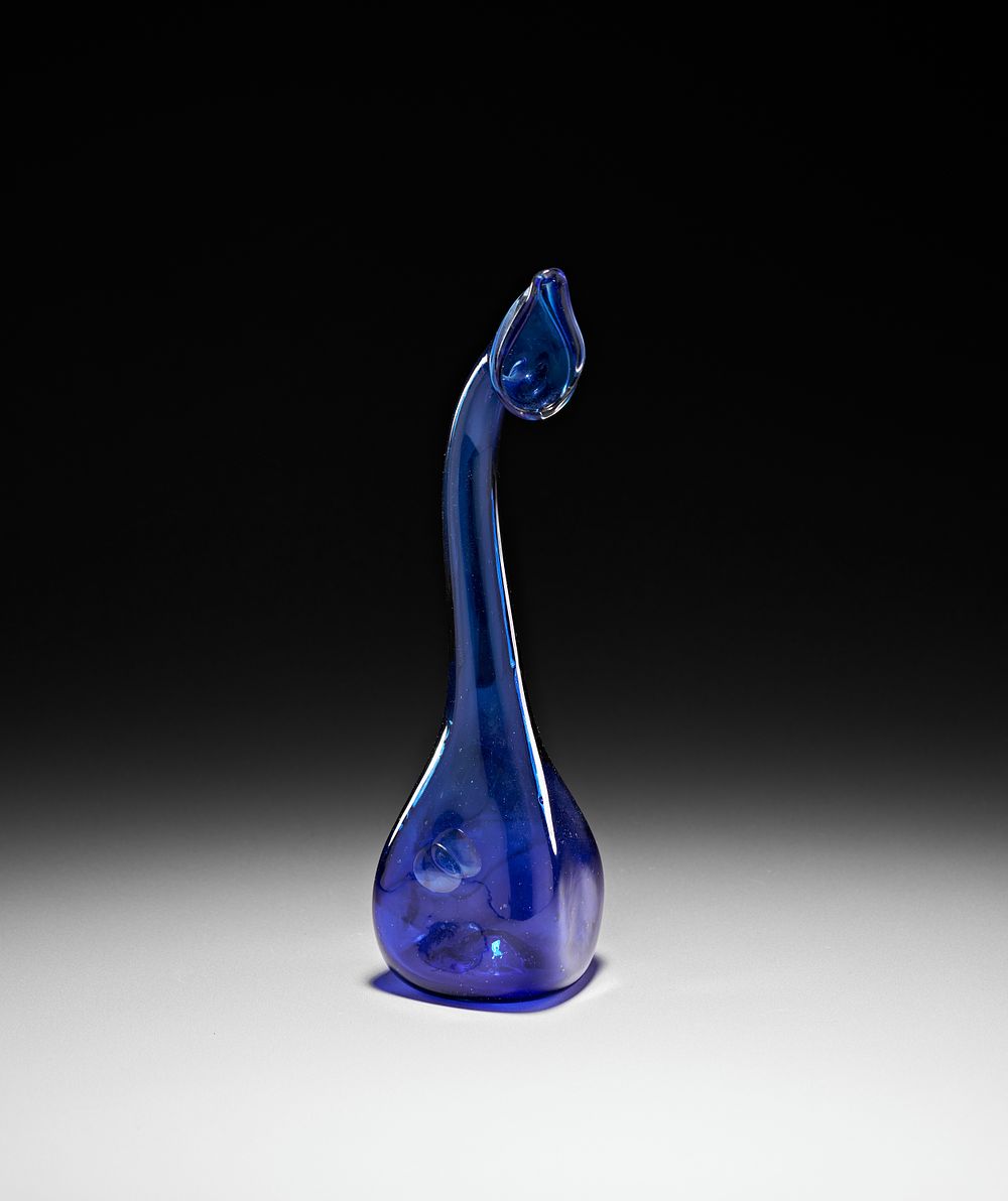 Lot 188: A BLUE GLASS PERSIAN "TEAR CATCHER" VASE/BOTTLE, QAJAR, 19TH CENTURY