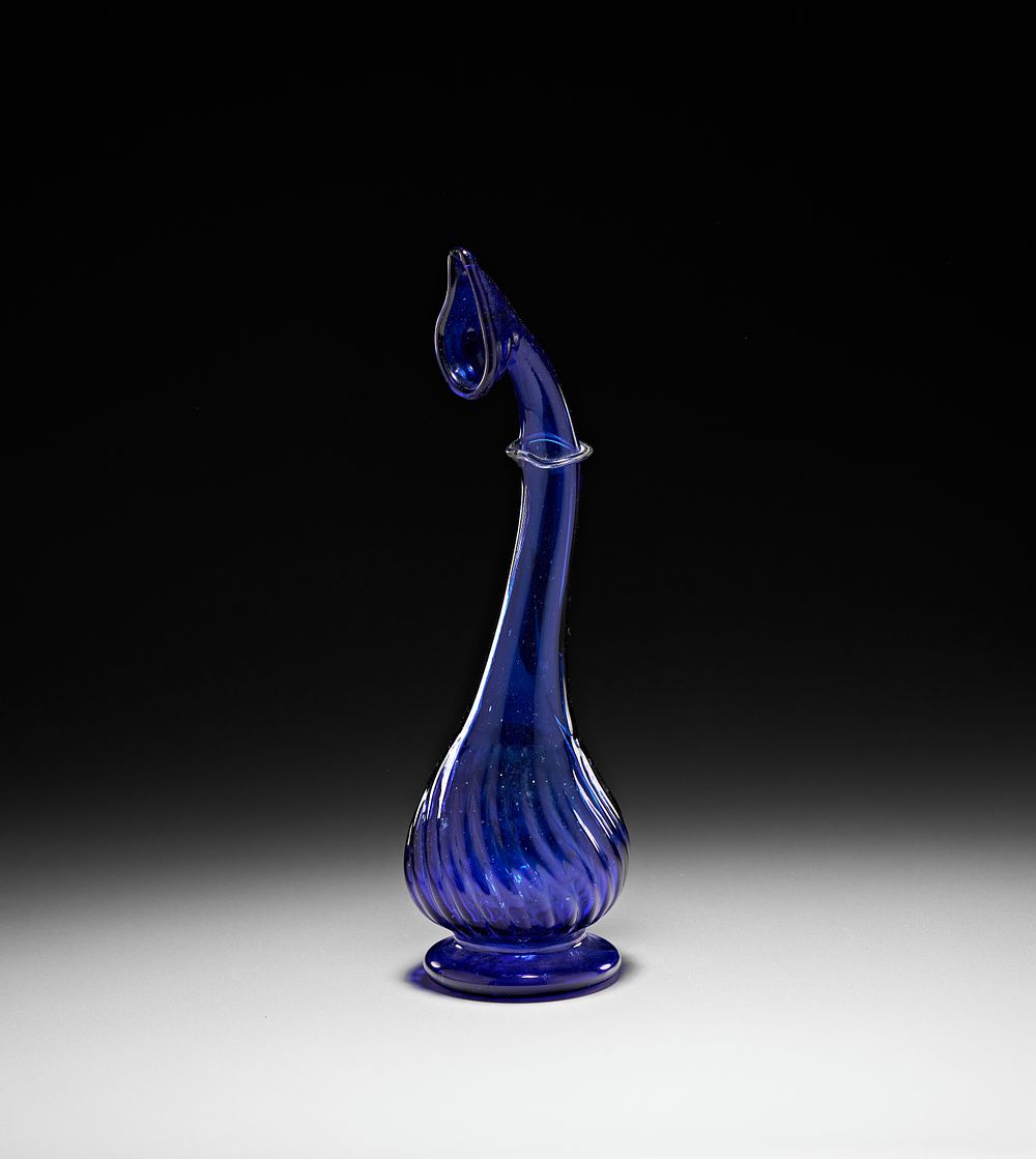 Lot 190: A BLUE GLASS PERSIAN "TEAR CATCHER" VASE/BOTTLE, QAJAR, 19TH CENTURY