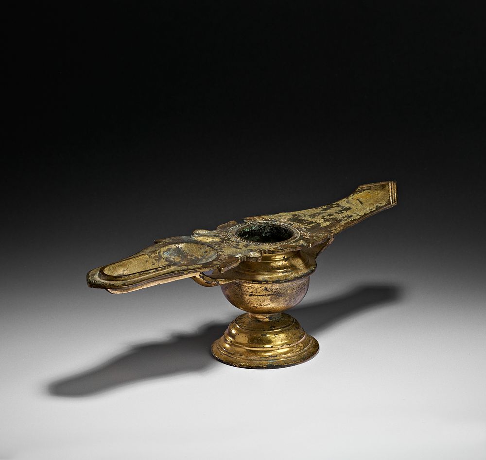 Lot 200: A GILT BRONZE OIL-LAMP, SOUTH INDIA, 17TH CENTURY