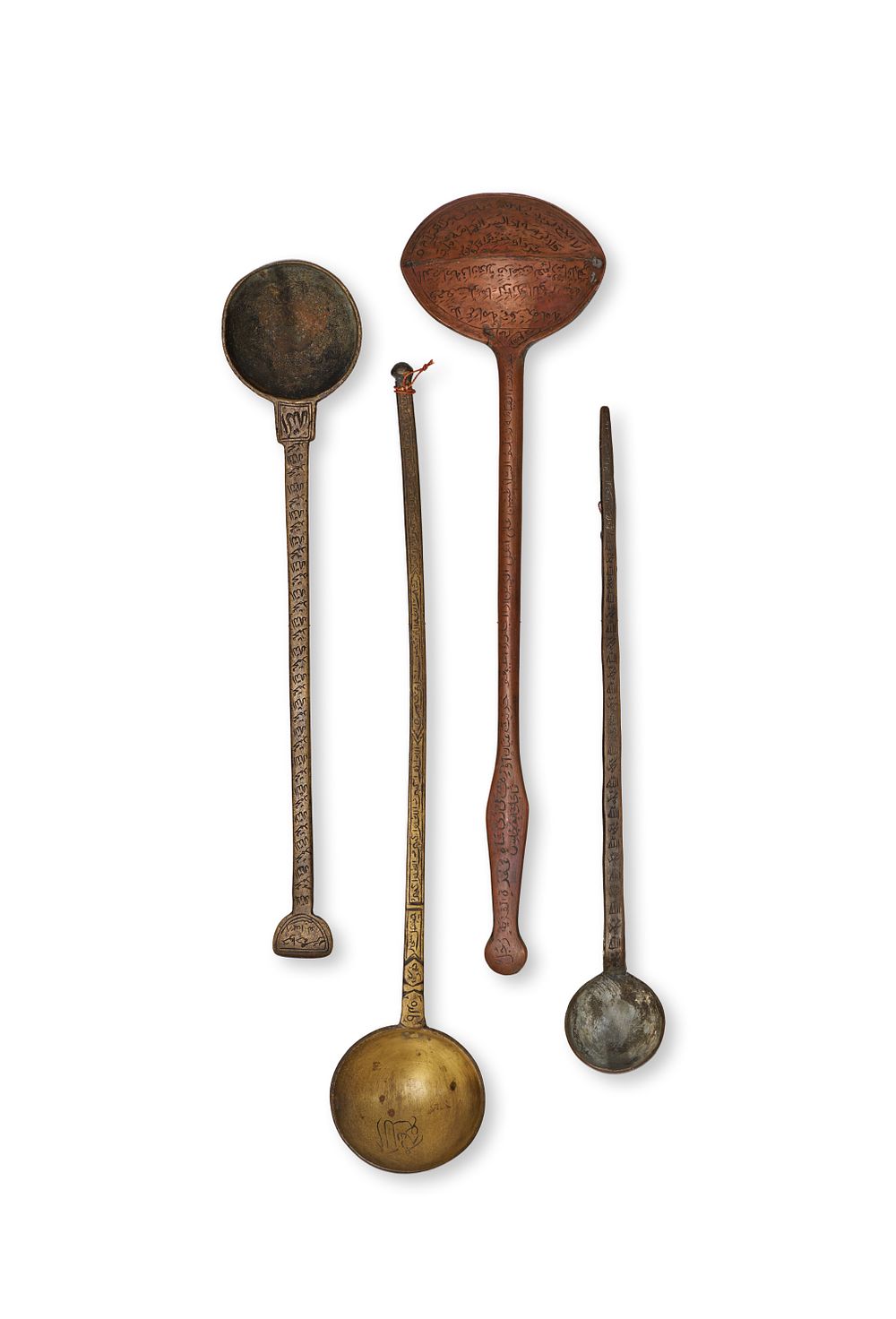 Lot 227: A COLLECTION OF FOUR ENGRAVED ISLAMIC SUFI TALISMANIC LADLES, 19TH CENTURY OR EARLIER