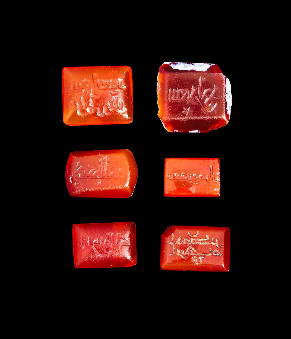 Lot 288: A GROUP OF SIX ENGRAVED AGATE WITH KUFIC SCRIPT, 9TH - 12TH CENTURY
