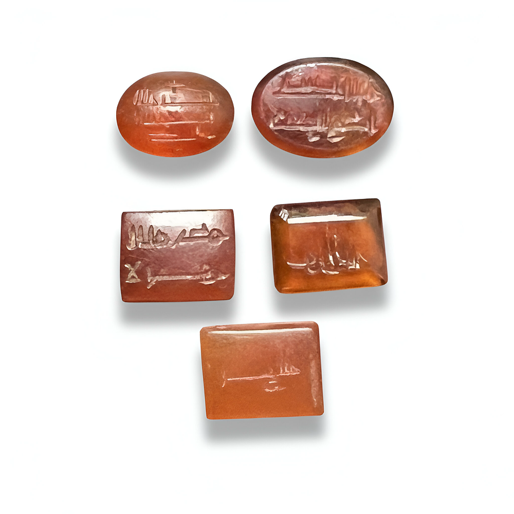 Lot 292: A GROUP OF EARLY ISLAMIC ENGRAVED AGATE SEALS/RING STONE WITH KUFIC SCRIPT, 9TH - 12TH CENTURY