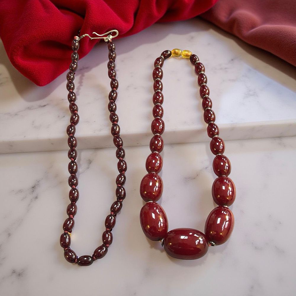 Lot 357: 2 sets of cherry amber bead necklaces