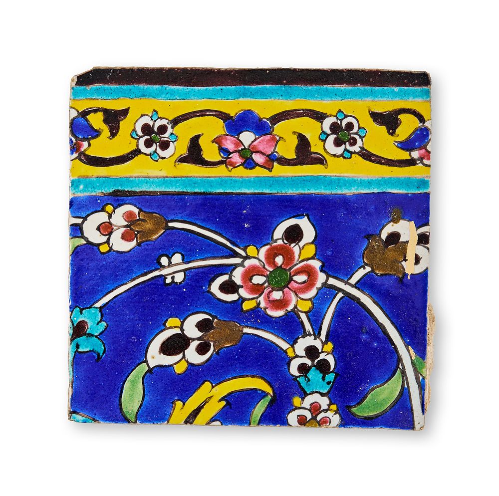 Lot 299: A QAJAR CUERDA SECA POTTERY TILE, IRAN, 19TH CENTURY