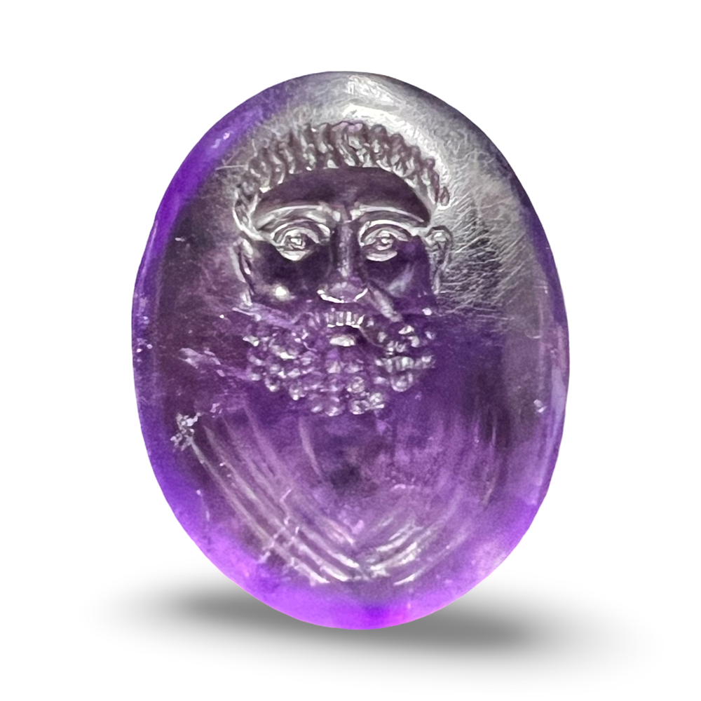 Lot 249: A Roman Amethyst Intaglio Portrait of a Bearded Man, 1ST - 2ND Century A.D.