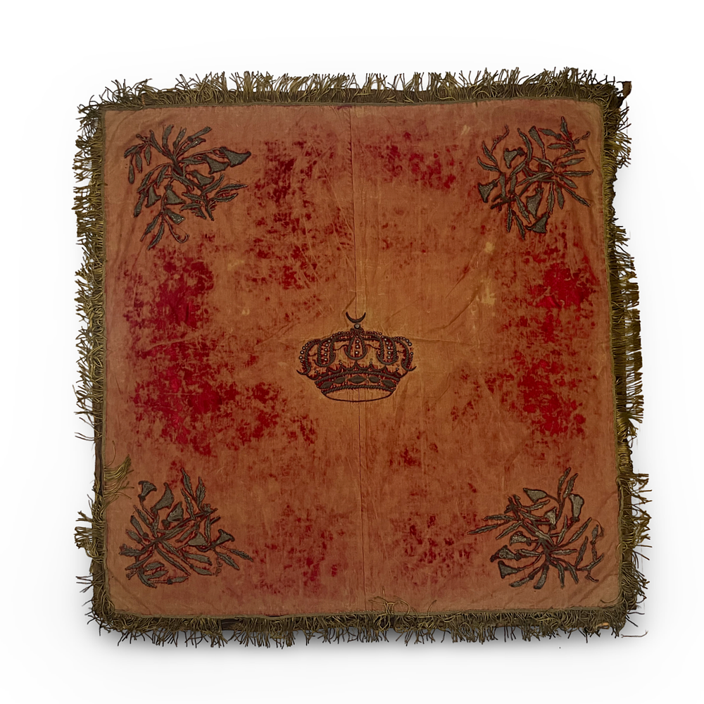 Lot 77: AN OTTOMAN VELVET AND METAL THREAD EMBROIDERED ARMORIAL PANEL, 19TH CENTURY