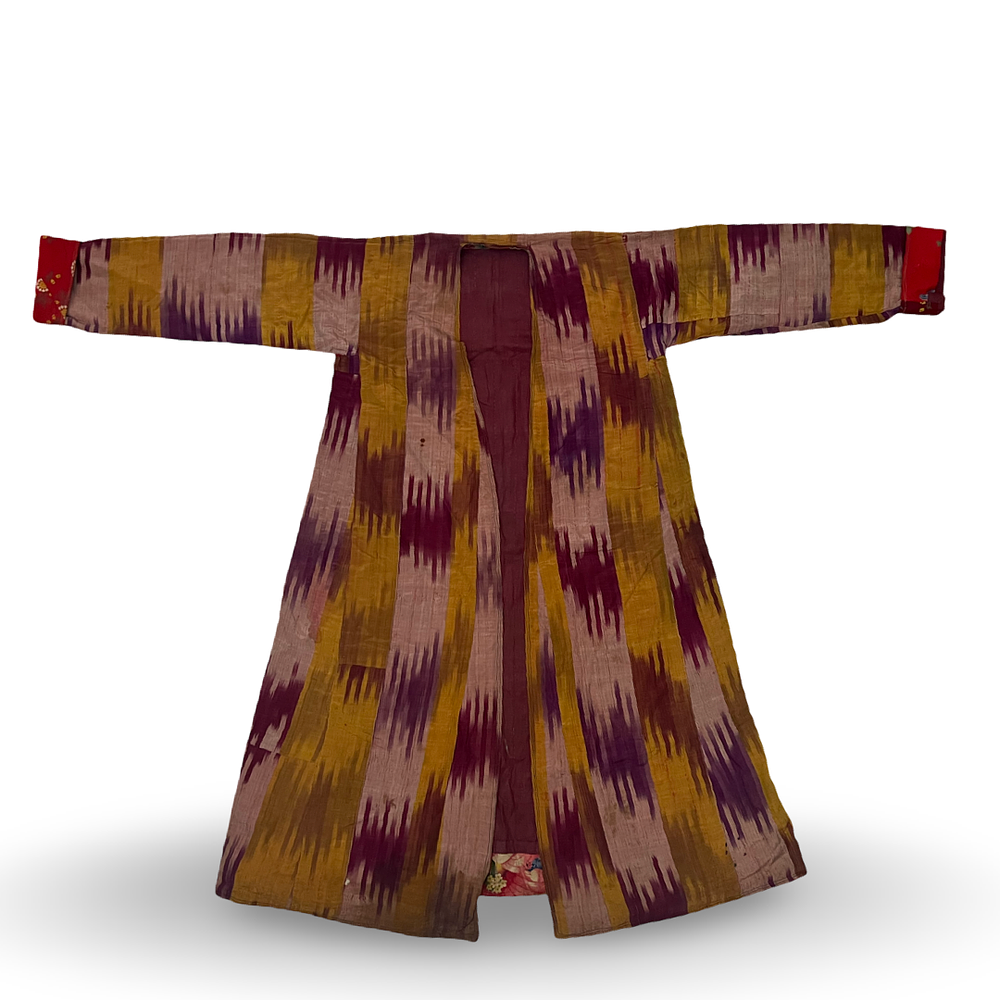 Lot 75: AN UZBEK SILK IKAT CHAPAN JACKET, 19TH - 20TH CENTURY