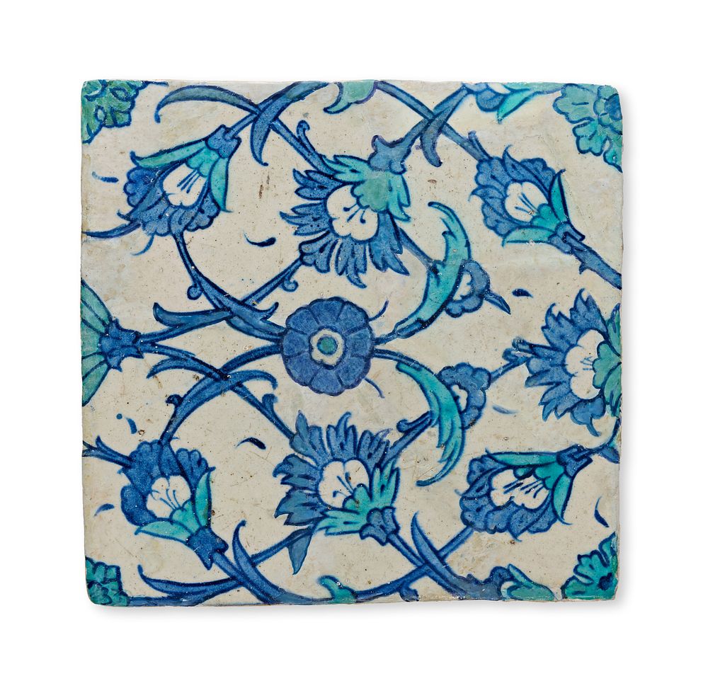 Lot 90: AN IZNIK BLUE AND WHITE POTTERY TILE, OTTOMAN TURKEY, CIRCA 16TH-17TH CENTURY