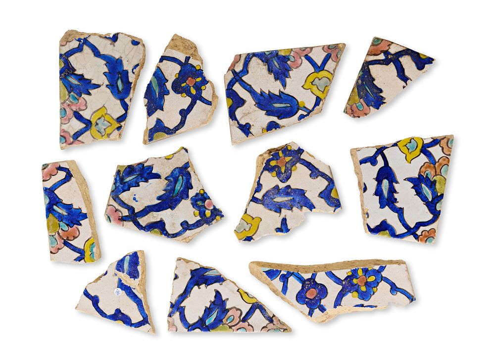 Lot 99: A Collection of Fragmentary Safavid Cuerda Seca Pottery Tiles, Persia, 17th Century