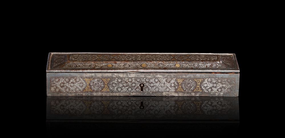Lot 191: AN INDO-PERSIAN SILVER AND GOLD INLAID KOFTGARI STEEL PEN BOX, 19TH CENTURY