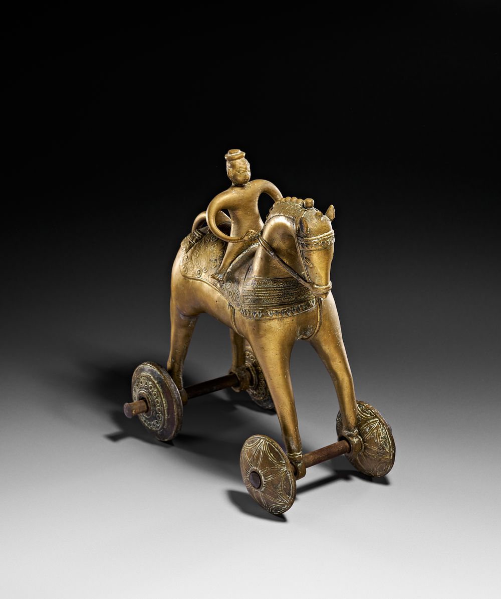 Lot 296: A BRASS HORSE AND RIDER TEMPLE TOY, INDIA, 19TH CENTURY