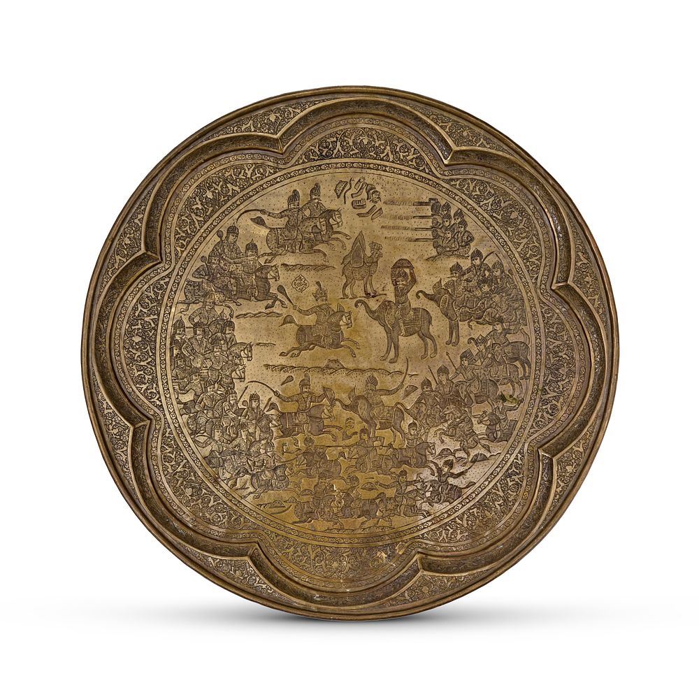 Lot 307: A LARGE ROUND PERSIAN QAJAR BRASS TRAY, 19TH CENTURY