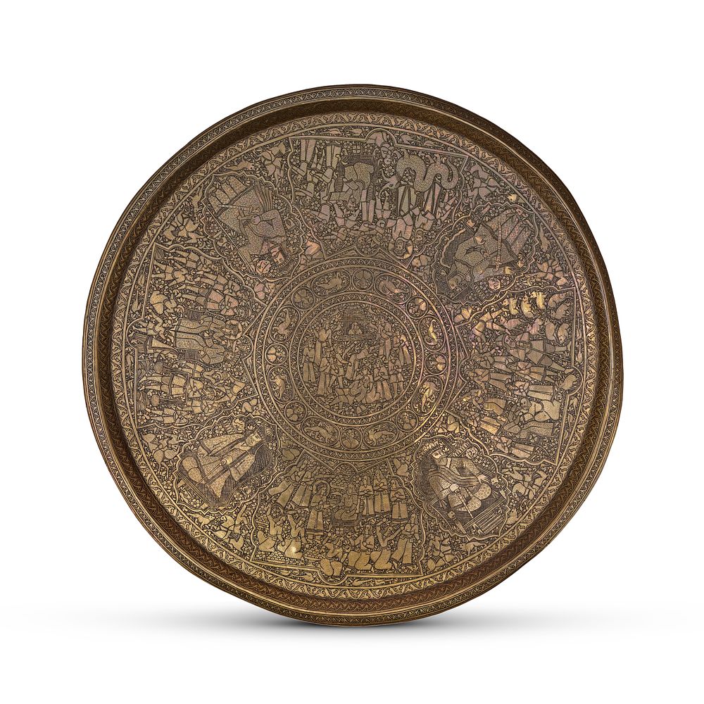 Lot 308: A LARGE ROUND ANTIQUE ZAND - QAJAR HAND-ENGRAVED BRASS TRAY, PERSIAN, 19TH CENTURY