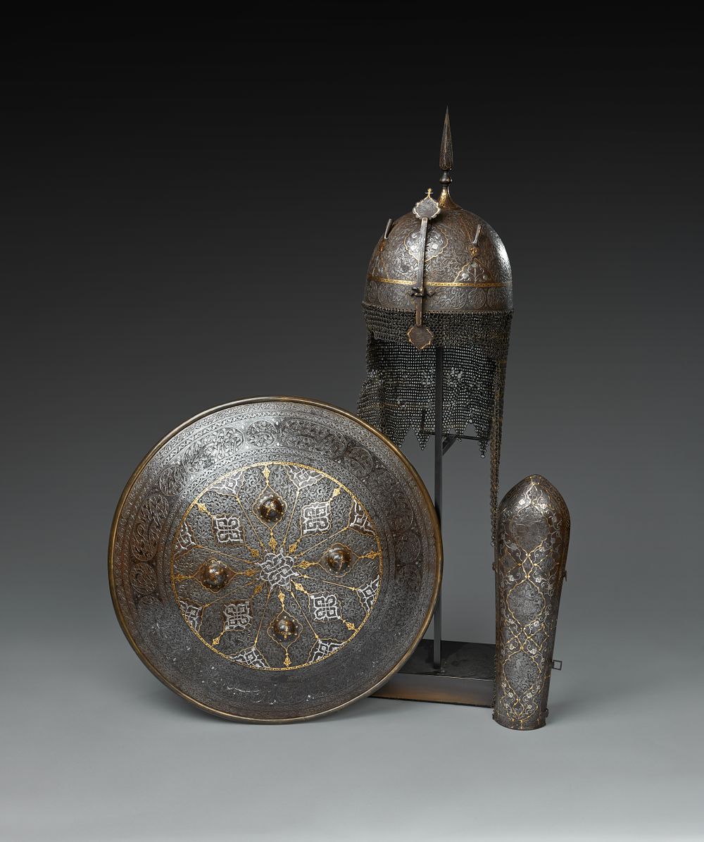 Lot 83: A SET OF QAJAR GOLD AND SILVER-DAMASCENED STEEL ARMOUR, PERSIA, 19TH CENTURY
