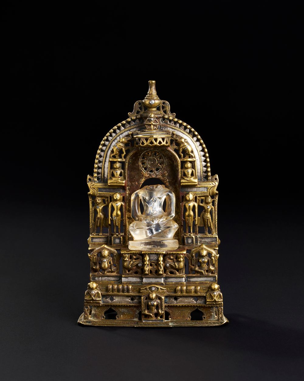Lot 313: A RARE AND IMPORTANT SOUTH INDIAN SILVER INALID BRASS OR BRONZE JAIN SHRINE WITH ROCK CRYSTAL DEITY, 15TH - 16TH CENTURY