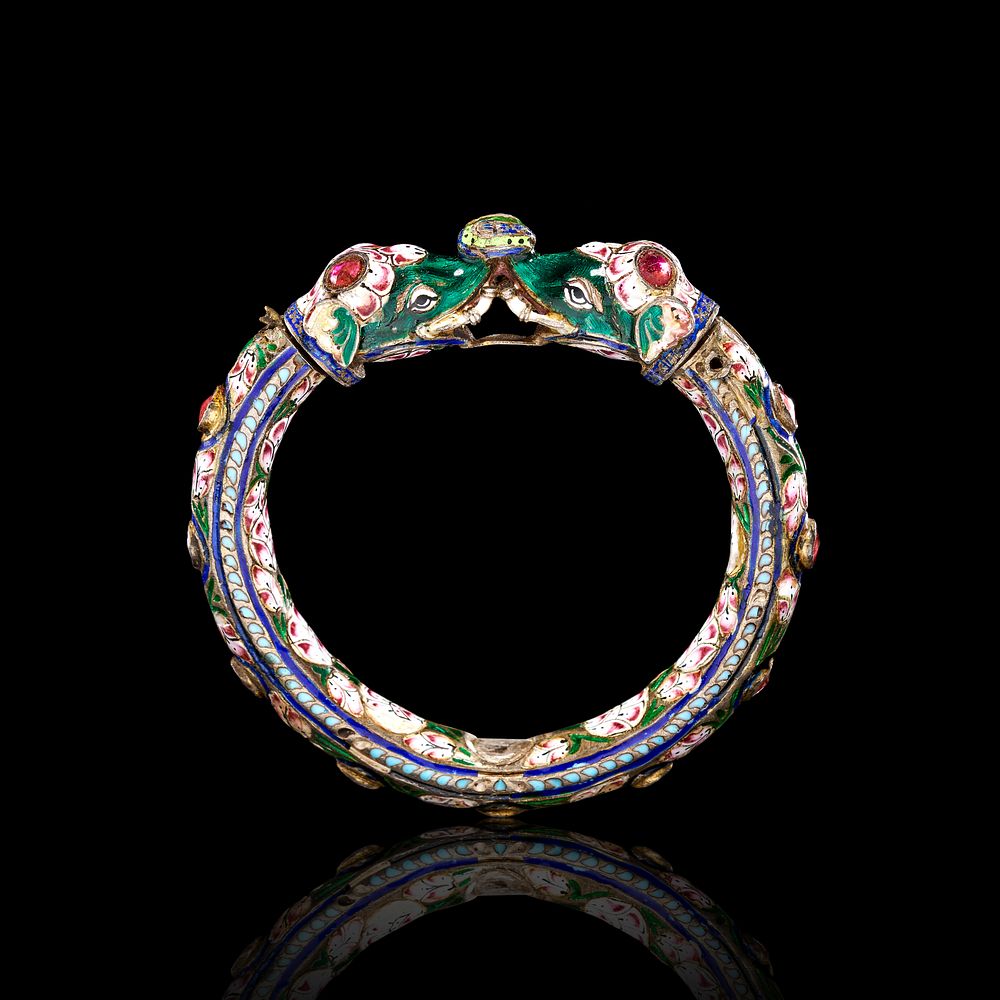 Lot 340: A GEN-SET ENAMELLED NAVRATNA BANGLE (KADA), JAIPUR, 20TH CENTURY