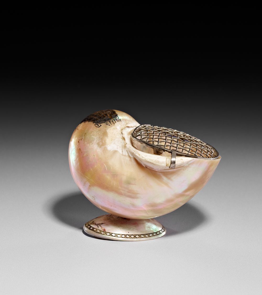Lot 330: A SILVER-MOUNTED NAUTILUS SHELL SOUVENIR CONTAINER, IINDIA, 19TH CENTURY