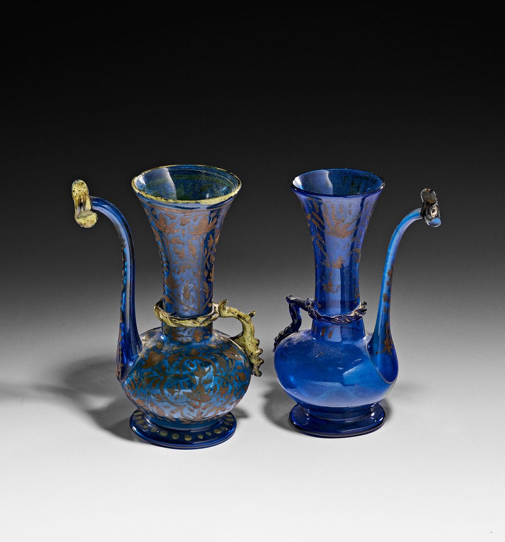 Lot 332: A PAIR OF SAFAVID GILT COBALT BLUE GLASS ROSEWATER SPRINKLERS (GULABDANS), PERSIA, 17TH CENTURY