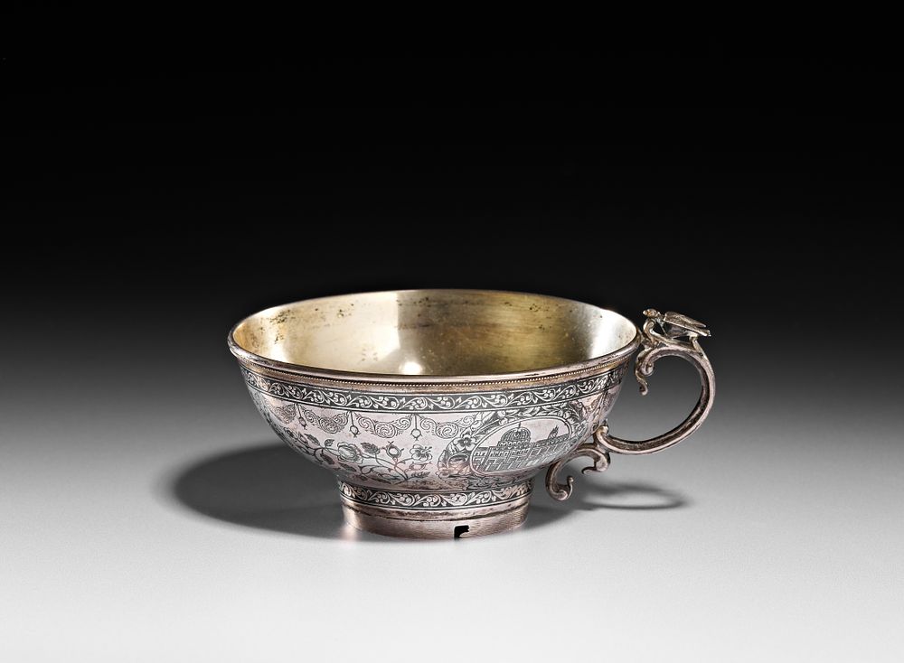Lot 346: AN OTTOMAN SILVER NIELLO HANDLED CUP WITH BIRD FINIAL BY VAN, TURKEY, 19TH CENTURY