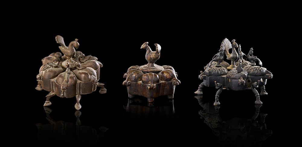 Lot 353: A TRIO OF INDIAN CAST BRASS PEACOCK KUMKUM OR SPICE BOXES, 19TH CENTURY