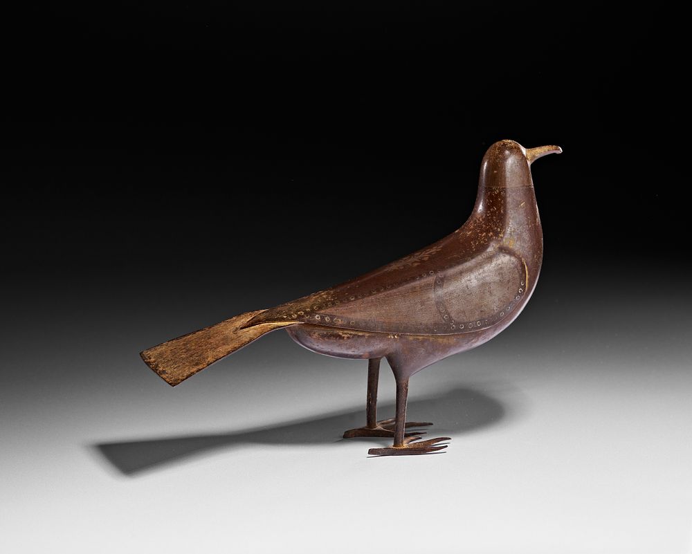 Lot 263: A LARGE QAJAR STEEL AND SILVER INLAID BIRD, PERSIAN, 19TH CENTURY
