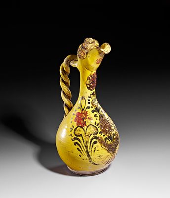 A YELLOW CANAKKALE POTTERY EWER, OTTOMAN TURKEY, 19TH CENTURY . Featuring a bulbous body, a long 