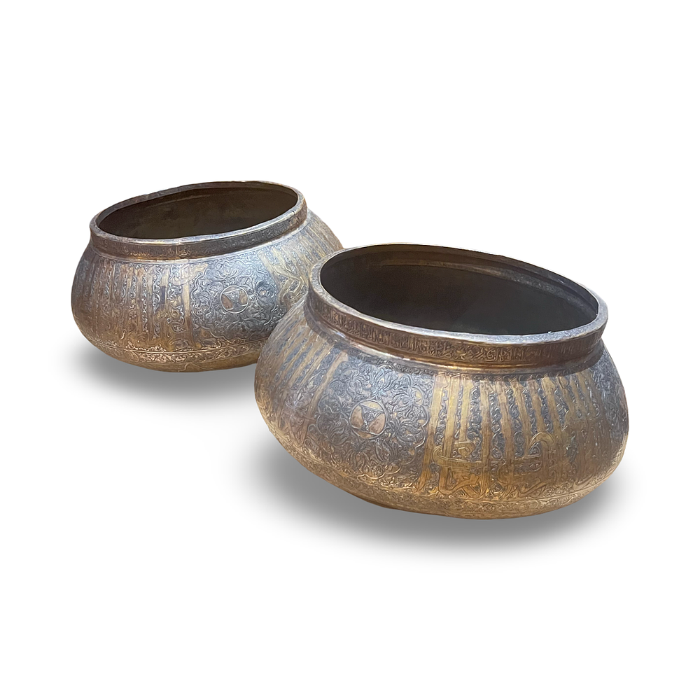 Lot 228: A LARGE PAIR OF MAMLUK REVIVAL SILVER-INLAID BRASS BASINS, 20TH CENTURY