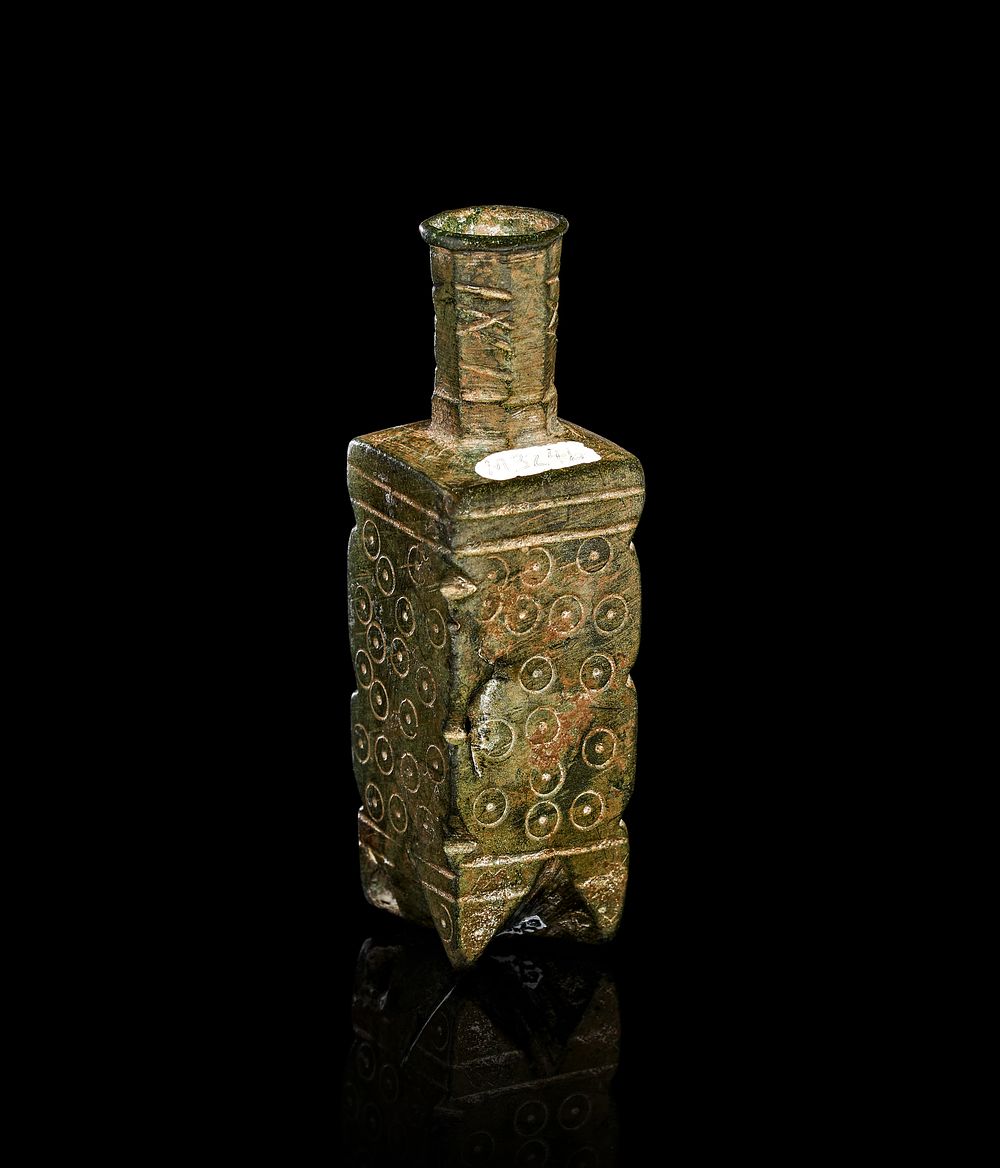 Lot 256: A RARE RECTANGULAR BONZE SHAPED FATIMID VESSEL/FLASK, EGYPT, 11TH CENTURY
