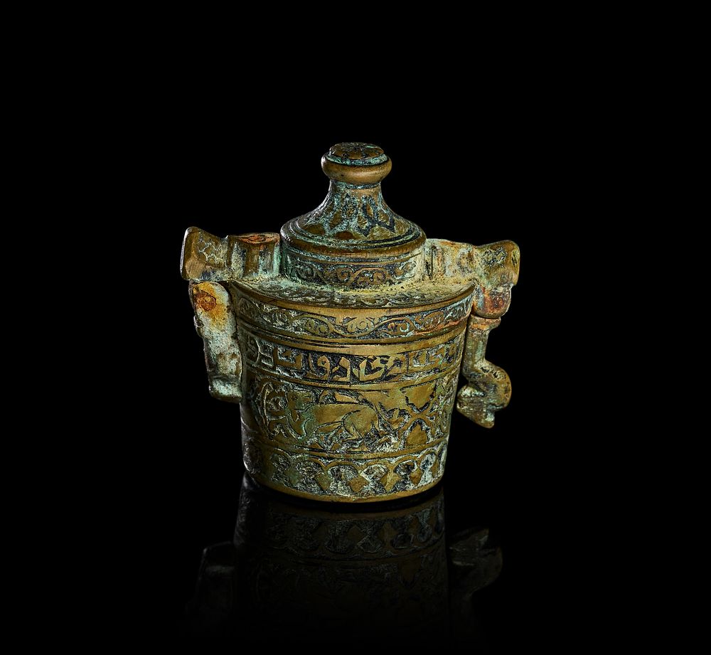 Lot 276: A KHURASAN BRONZE INKWELL, PERSIA, CIRCA 12TH-13TH CENTURY